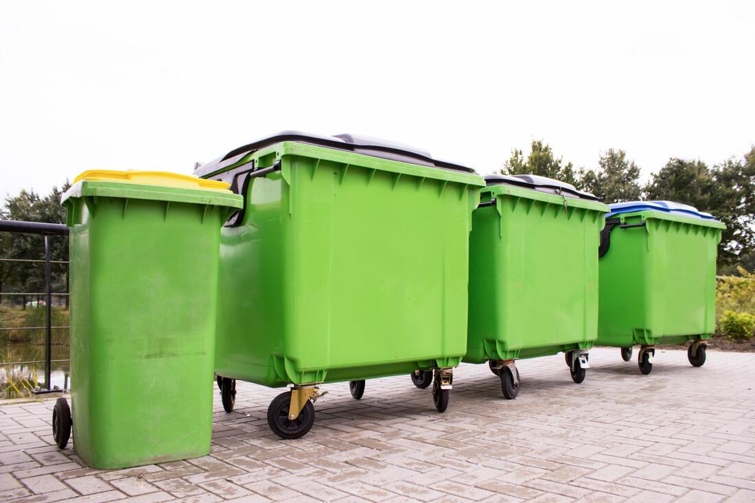 dumpsters outside ready for office clean up
